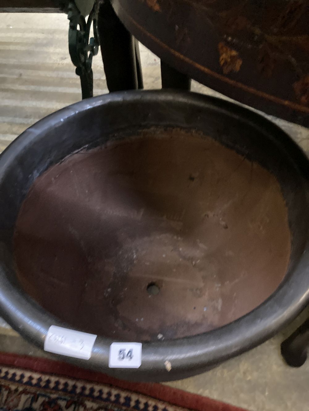 A circular glazed garden planter, height 37cm